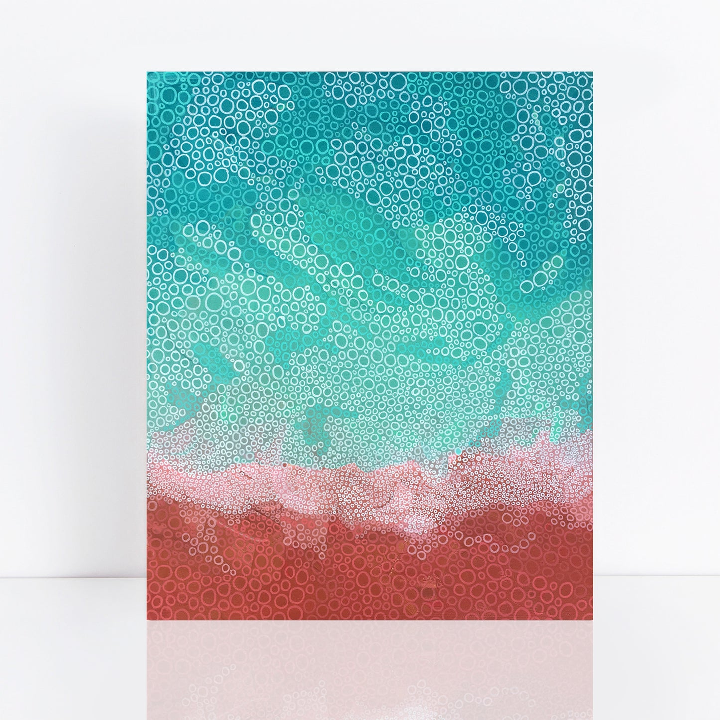 abstract painting of turquoise sea meeting red coastline