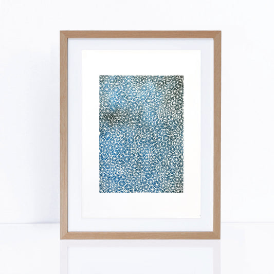  blues artwork with delicate white details patterns in frame