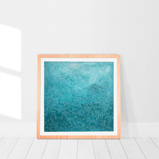 print in a frame of a turquoise abstract painting
