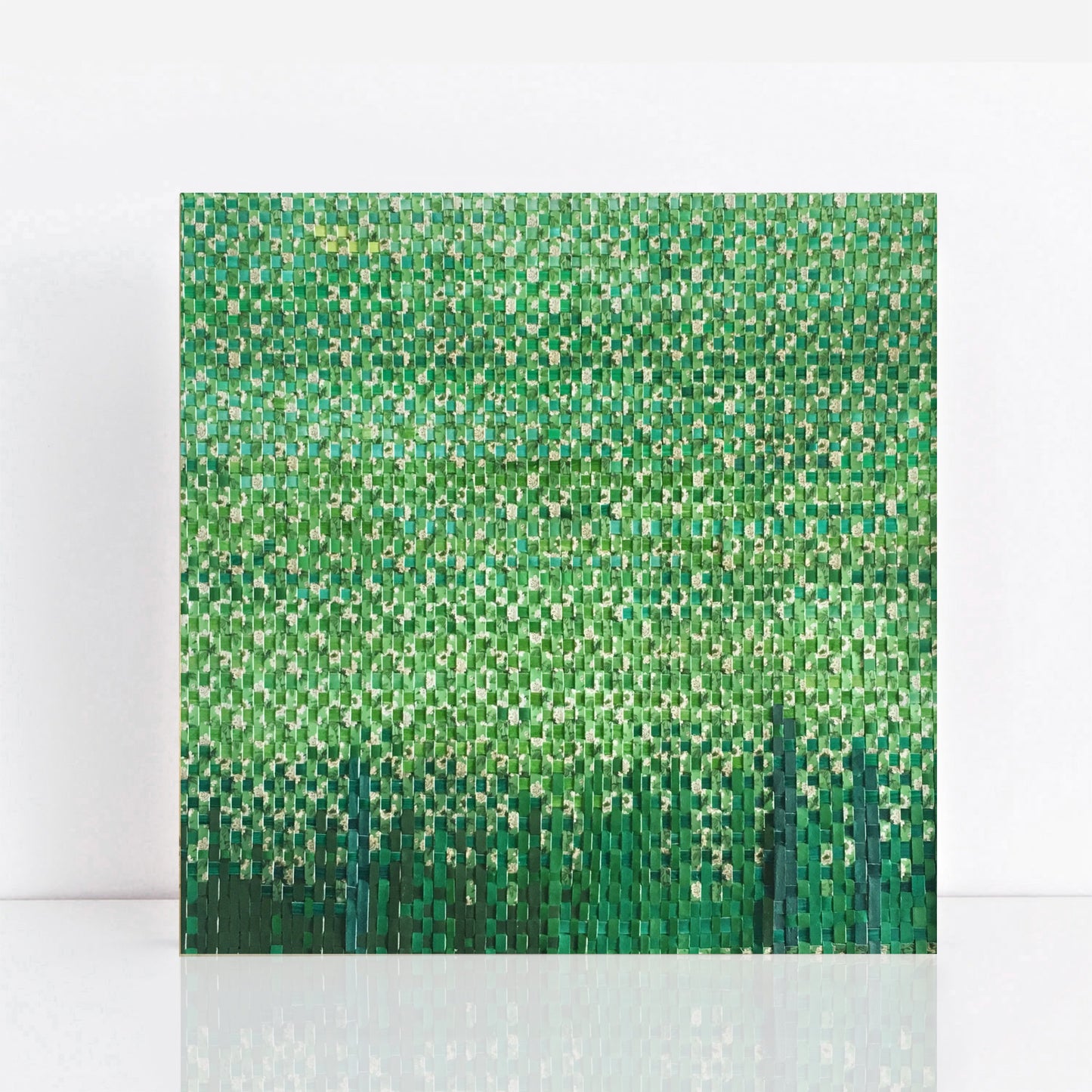 The Mock Orange Trees, a finely woven artwork constructed from painted strips of paper and recycled paper, capturing the layered textures and dappled light of flowering trees
