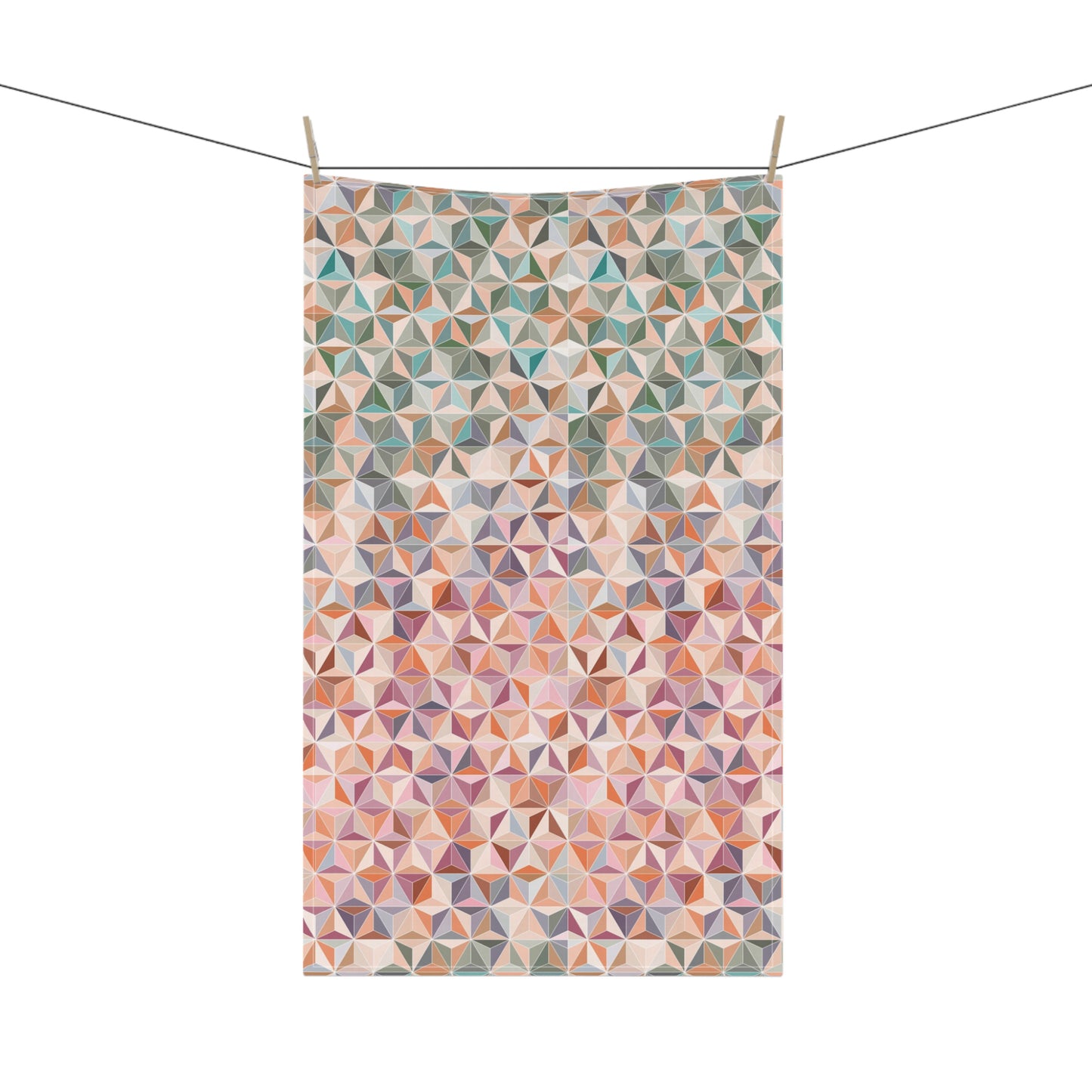 colourful tea towel, featuring a stunning pattern of interlocking triangles in soft pastel and earthy shades