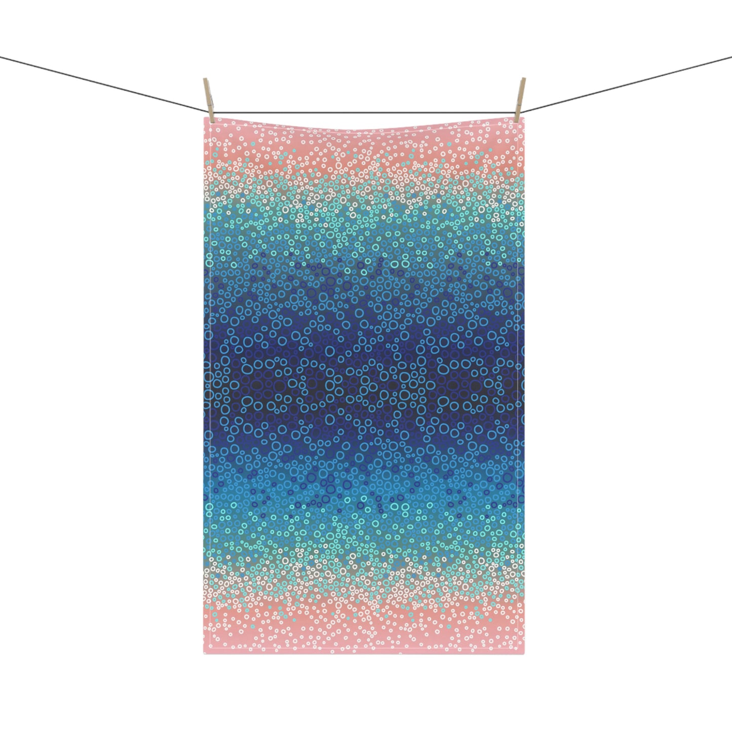 tea towel, featuring a mesmerising gradient of blues, turquoise, and pinks with intricate circular patterns