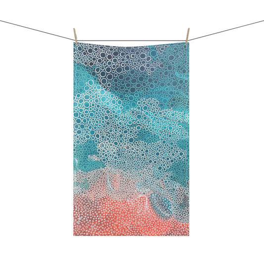 tea towel, featuring a soothing mix of seafoam turquoise, blue and coral tones