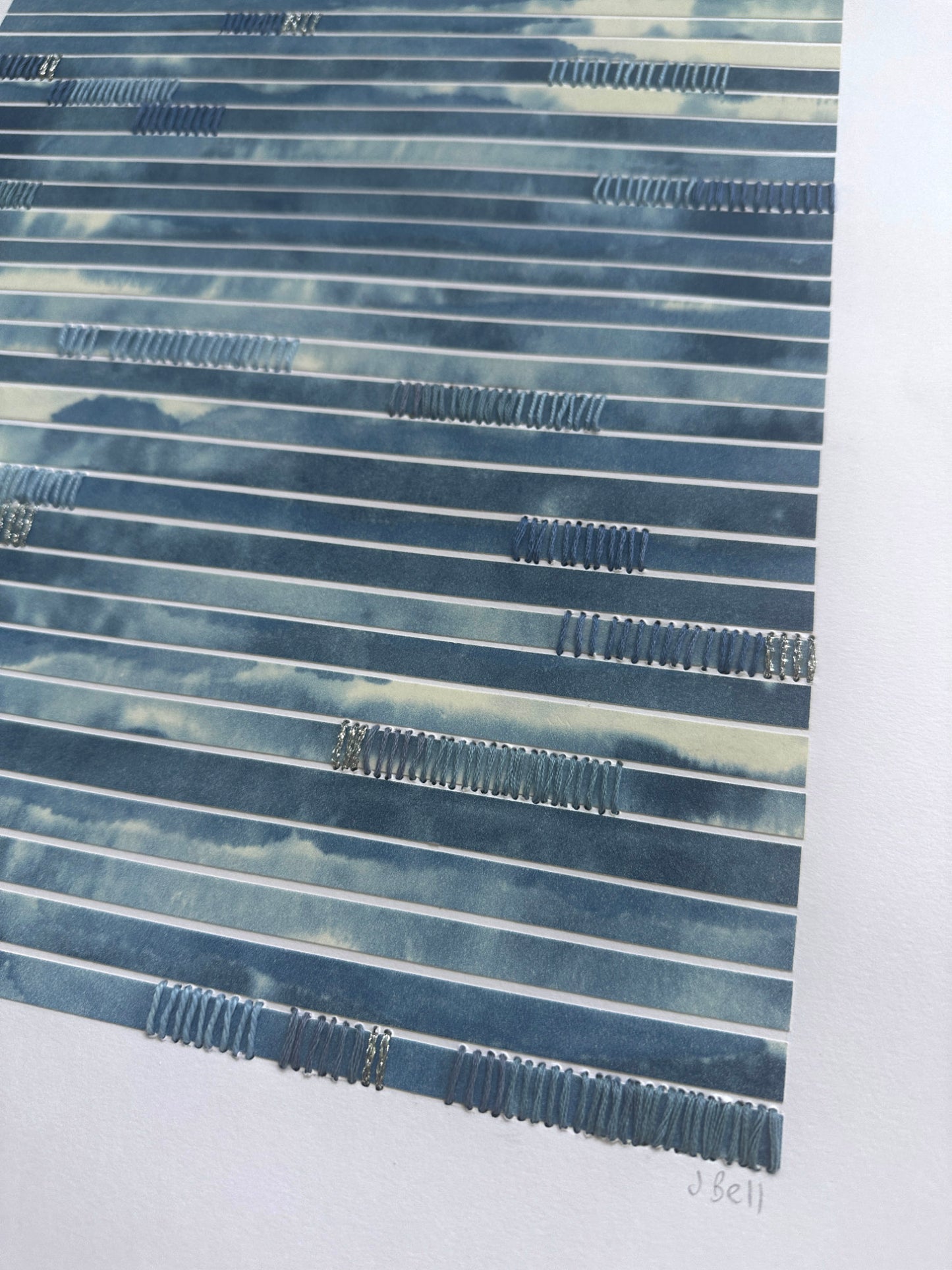 Textured blue and white patterned artwork