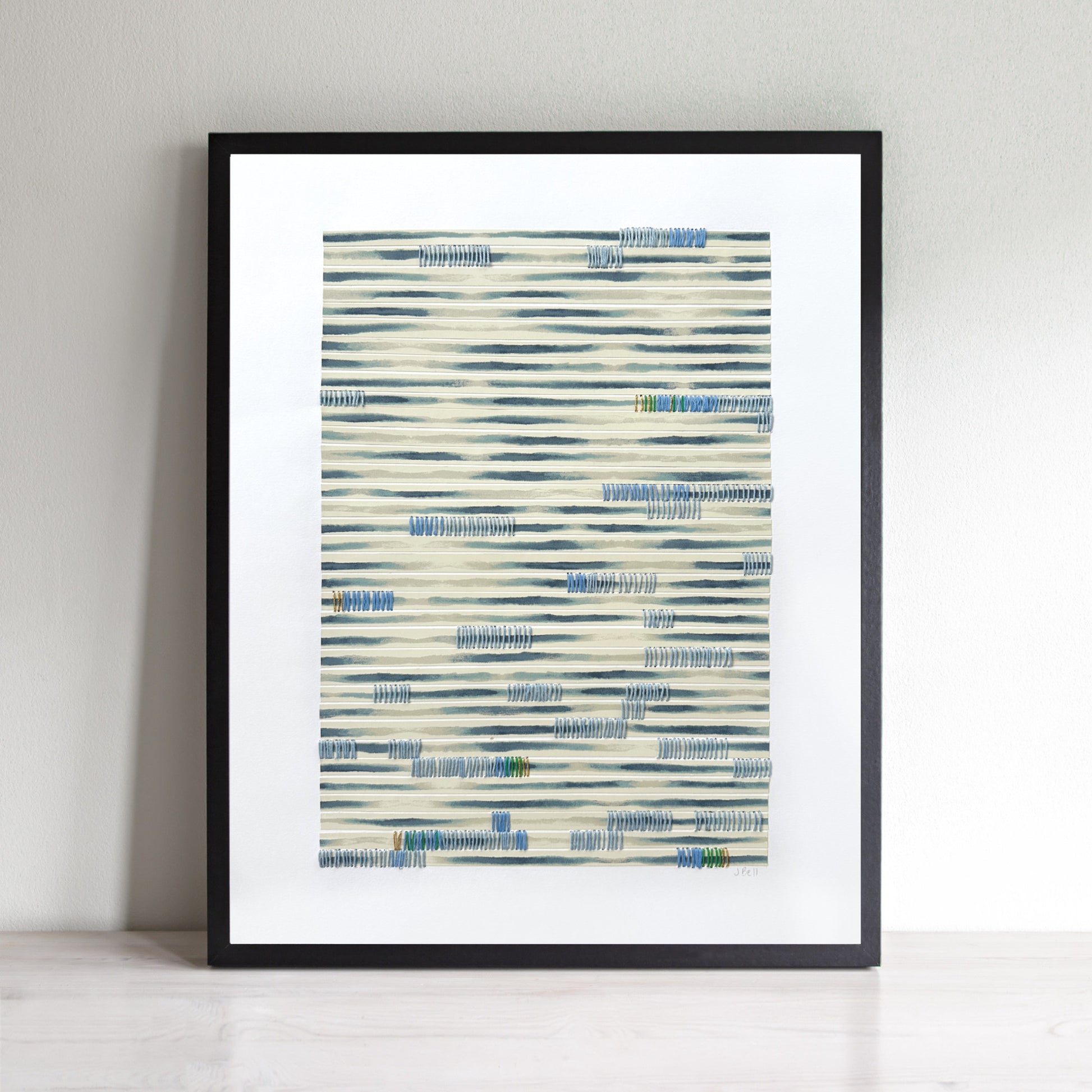 Abstract art with blue strips and hand stitching