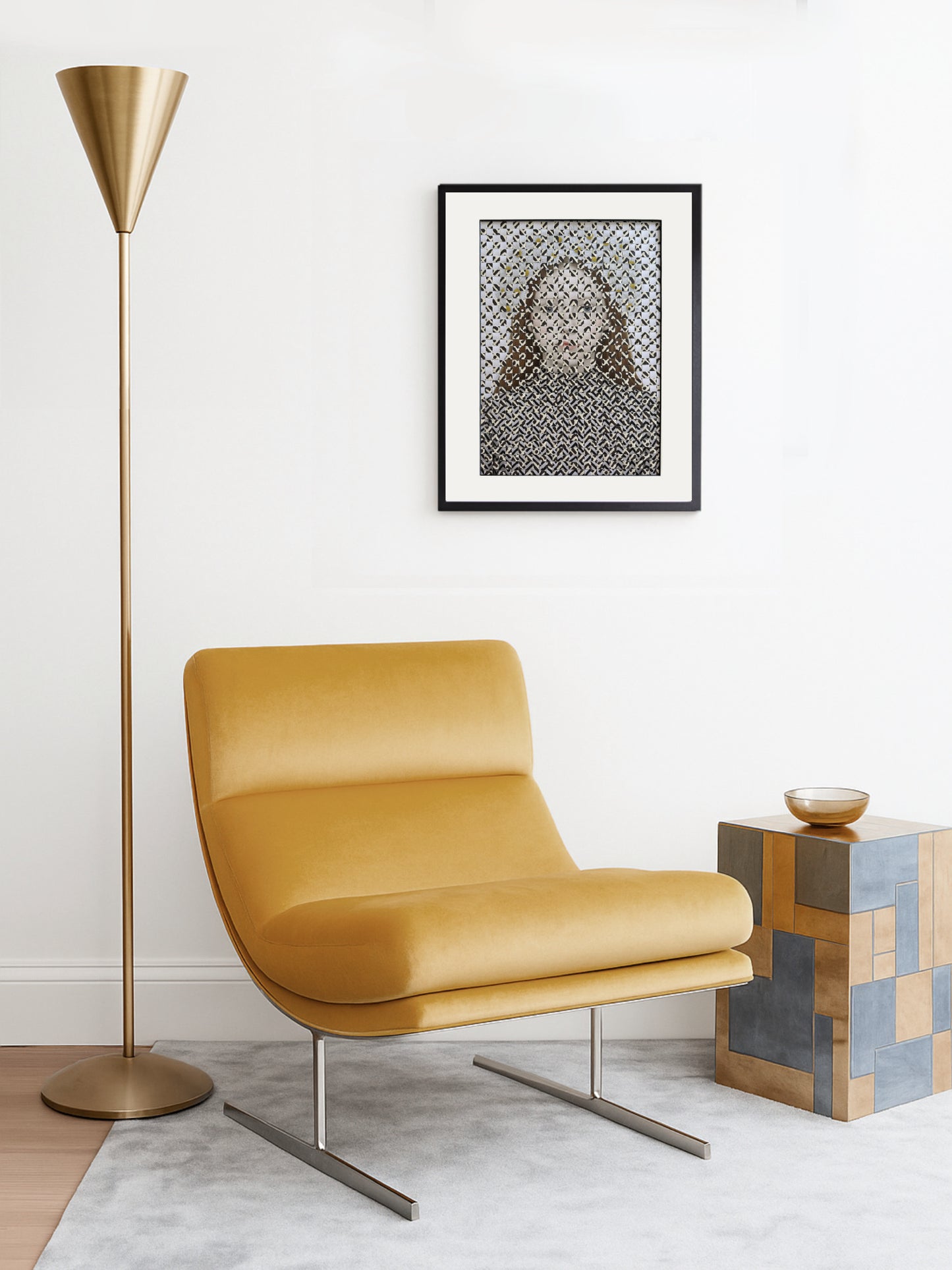 Modern yellow chair with a gold floor lamp and abstract art in a room.