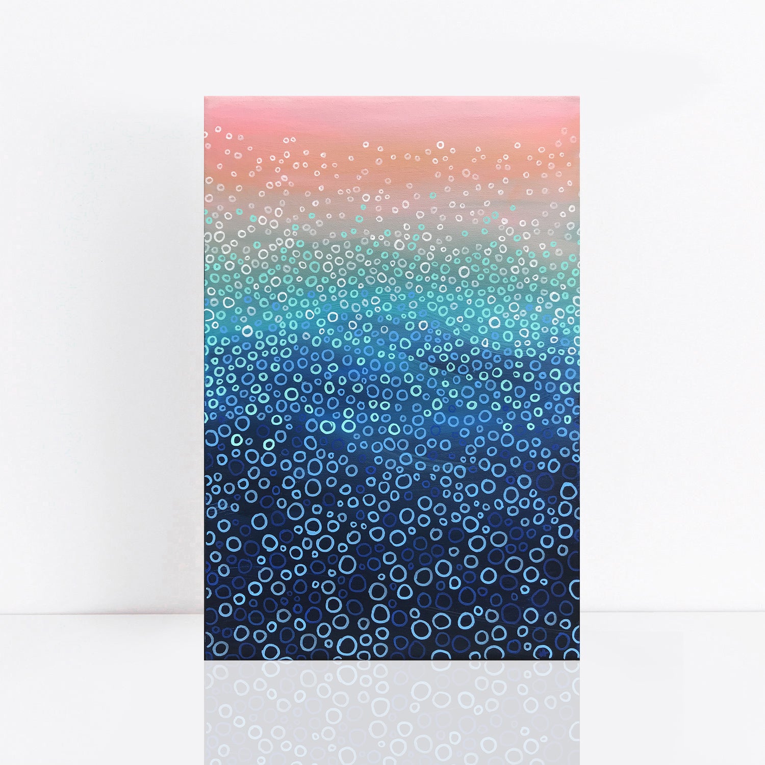 Abstract pointillism painting in shades of blue, turquoise and pink.