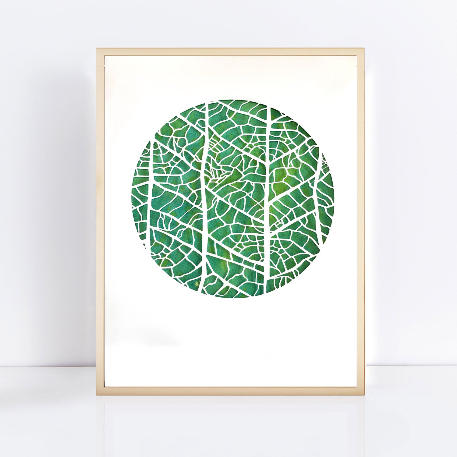 green cut paper artwork of leaf veins