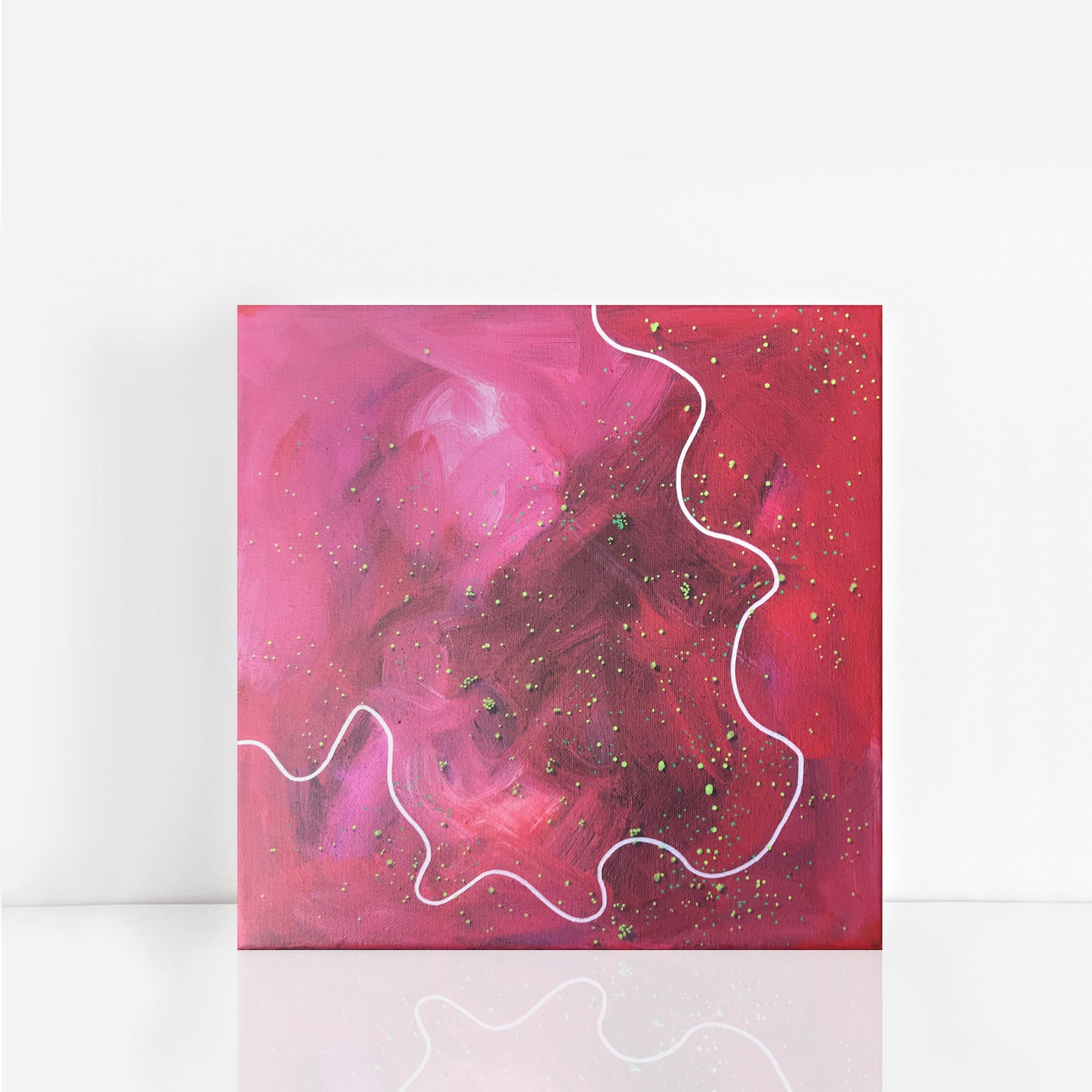 small red abstract painting of the Australian outback from above,