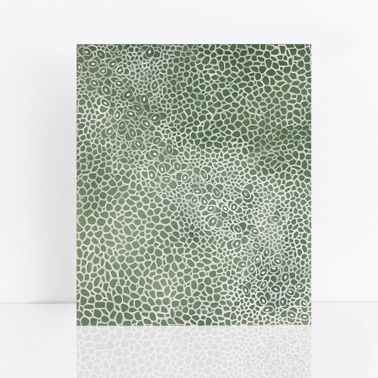 green painting with cut paper organic pattern
