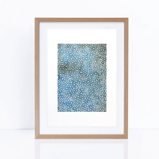 blues artwork with delicate white details patterns in frame