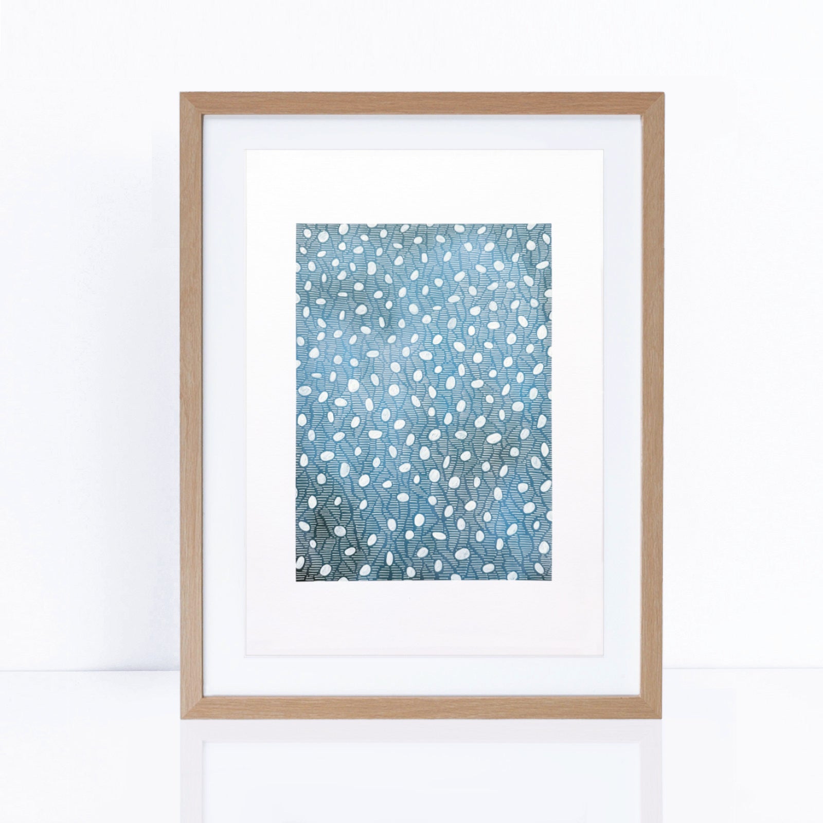 blue organic pattern artwork on paper in frame