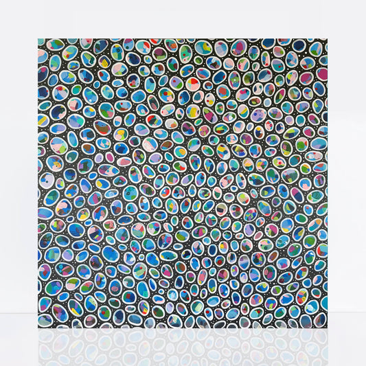 an abstract painting that features an array of small, oval-shaped pebbles scattered across the canvas. The pebbles are tightly packed, each one outlined in white, and filled with bright, swirling colors like blue, green, pink, purple, and red.