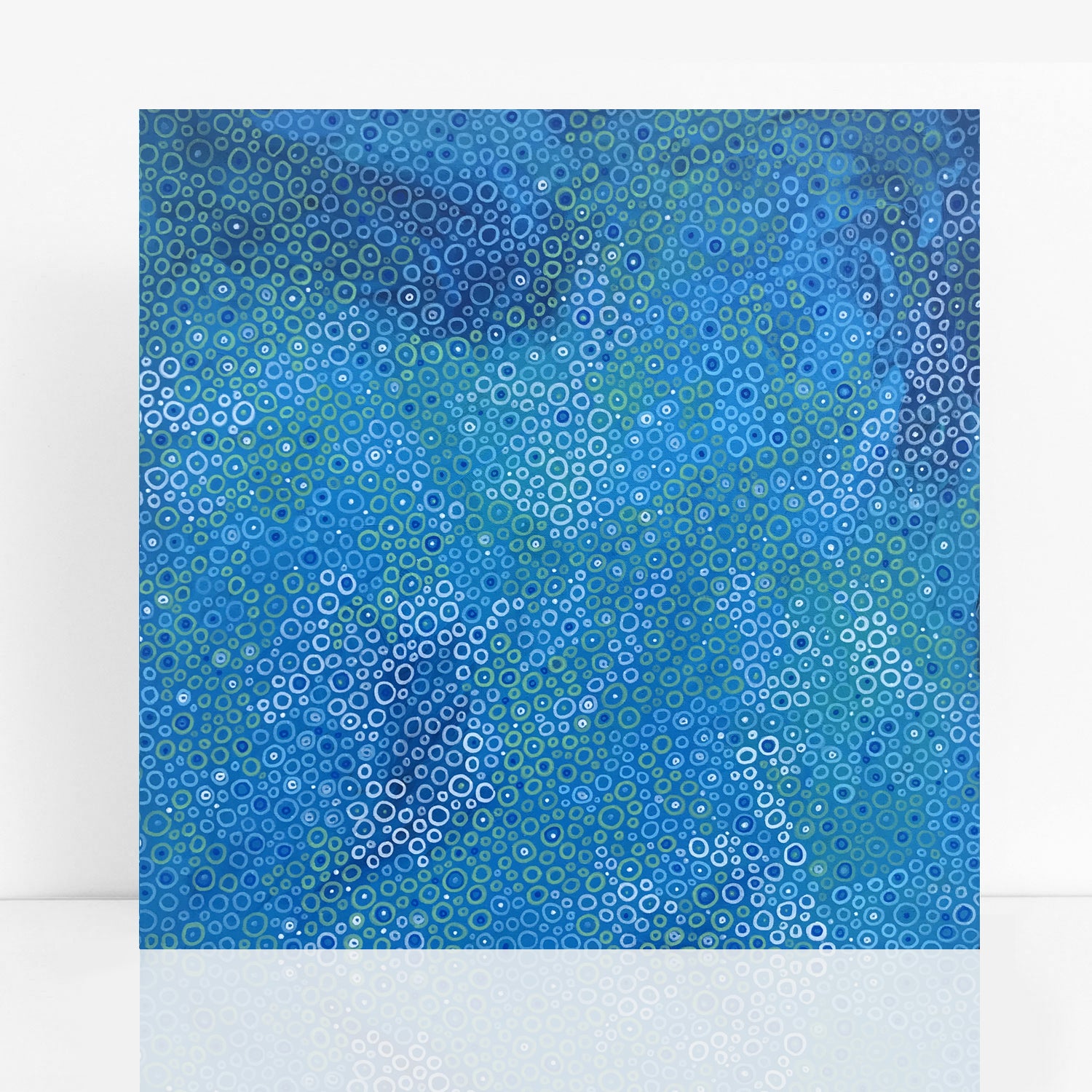 abstract painting in a mix of blues and greens with circles like bubbles in water