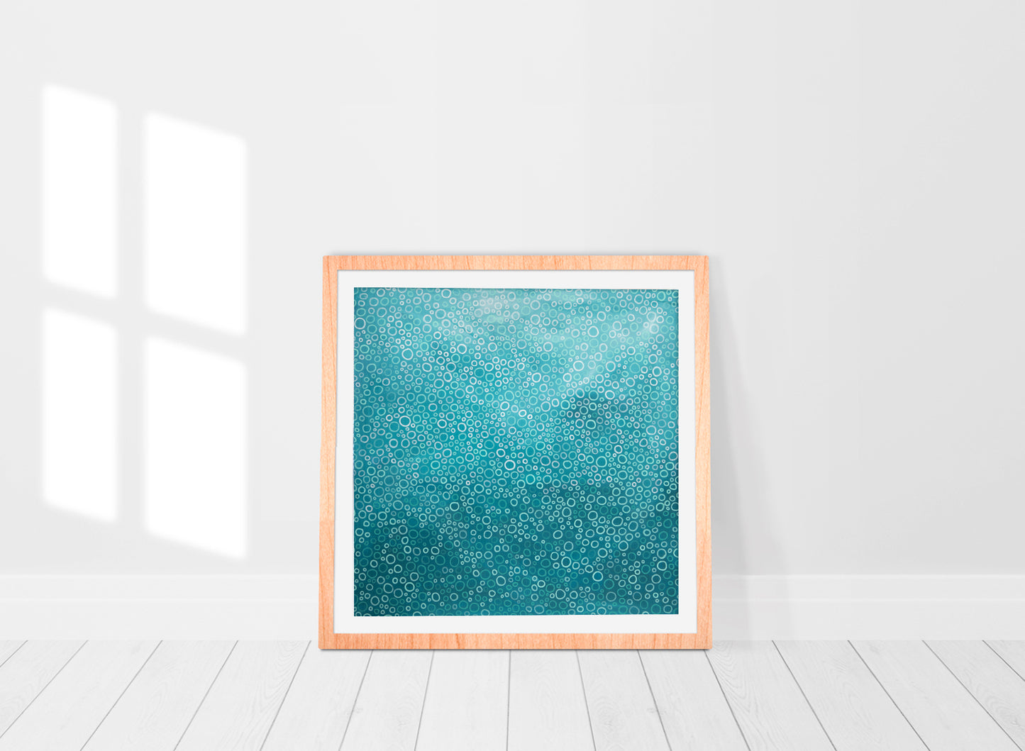 print in a frame of a turquoise abstract painting