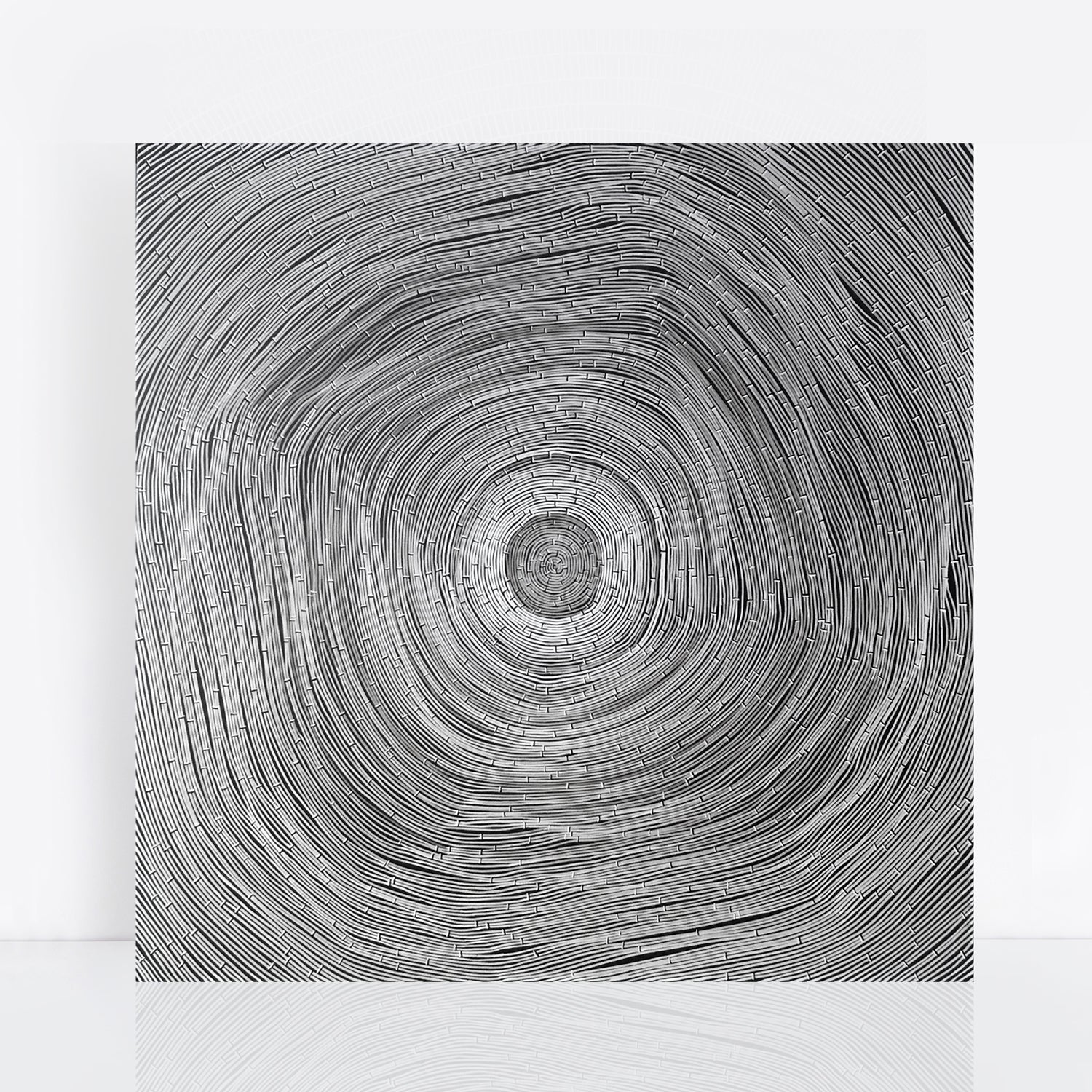 large black and white abstract painting of a round weaving