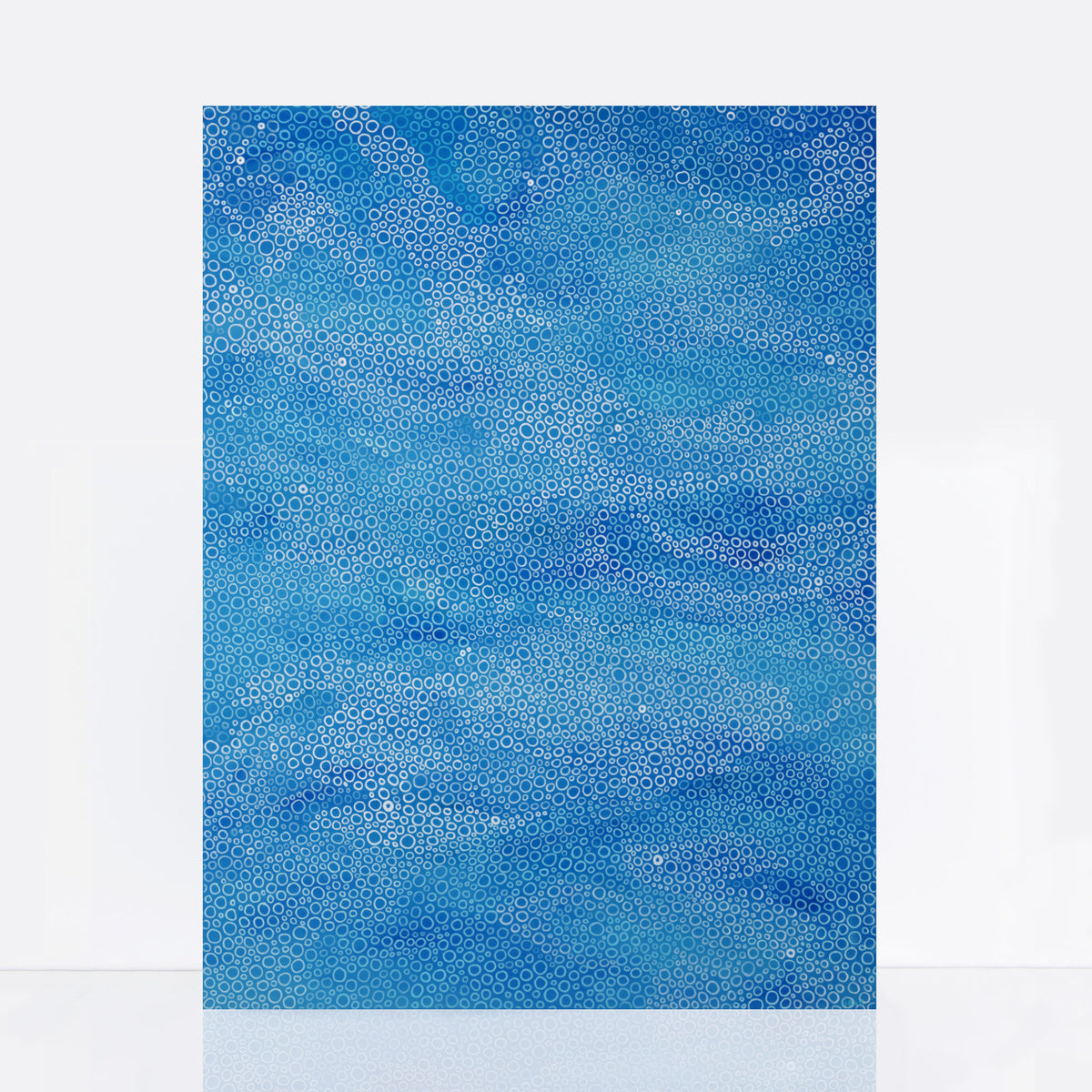 Large blue abstract painting with hand-drawn circular patterns inspired by waves and the sea, layered in tones of ocean blue