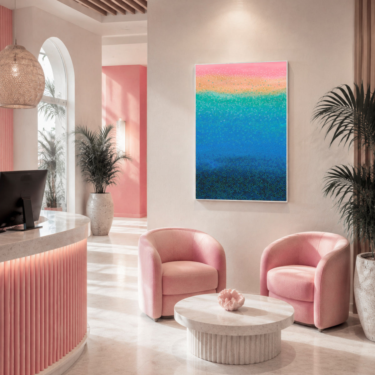 Colourful abstract art print styled in a contemporary hotel lobby, featuring two pink armchairs and a round marble coffee table, showing commercial artwork for hospitality and interior design projects 