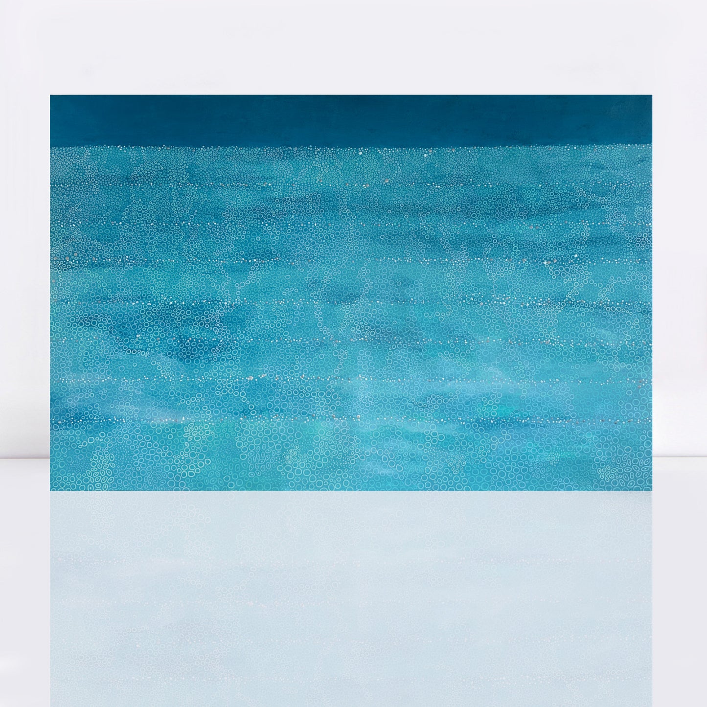 Original abstract ocean-inspired painting in shades of turquoise, aqua and deep blue. Layers of hand-painted circles create a flowing wave-like pattern across the canvas, fading into a darker atmospheric blue band at the top. Metallic accents catch the light, adding depth and movement to this contemporary acrylic artwork.